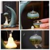 Antique Ceramic Buddha with Hanging Lotus Leaf Backflow Incense Burner Holder with LED Lighting