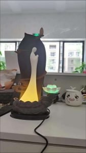 Electric LED Ceramic Zen Theme Standing Buddha Waterfall Incense Burner With Lotus and Cloud Wooden Base photo review