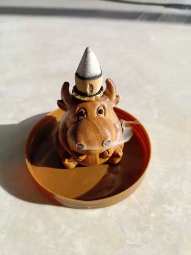 I was looking for something cute and unique for my workspace and this little cow incense burner caught my eye